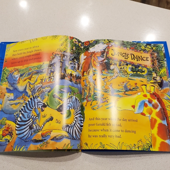 Brand new. "Giraffe's can't Dance" book. - Picture 4 of 4